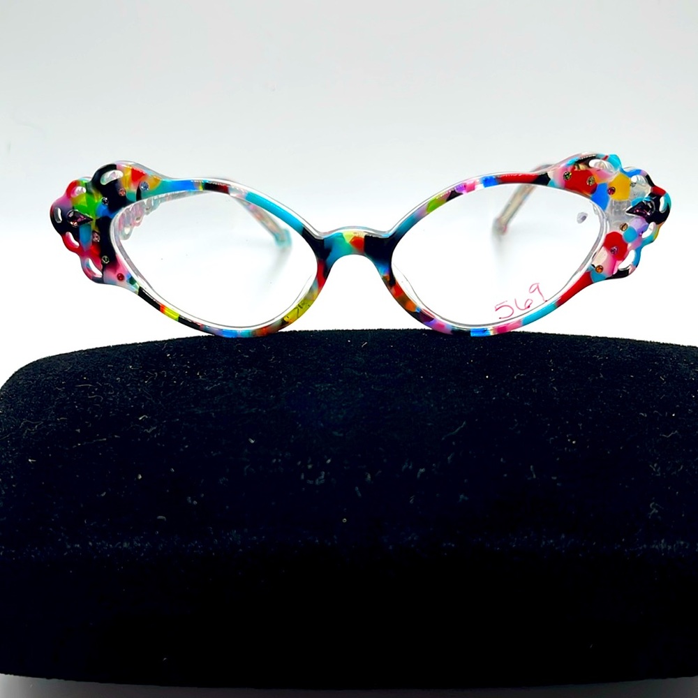 NWOT. Never worn. Faniel of Paris Multicolored frames with oval lenses.
